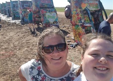 My daughter and I at Cadillac ranch on our trip th Sault sainte Marie